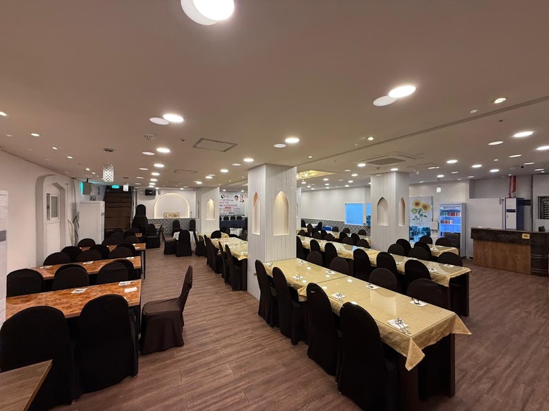 Spacious main dining hall setup with uniform seating arrangements