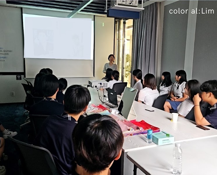 Personal color consultation seminar with fabric swatches in meeting room