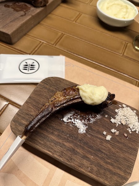 Grilled lamb chop served with signature cream and salt