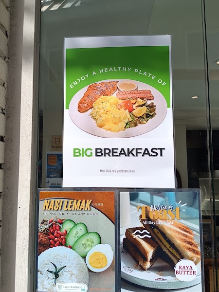 Menu posters on the glass storefront window