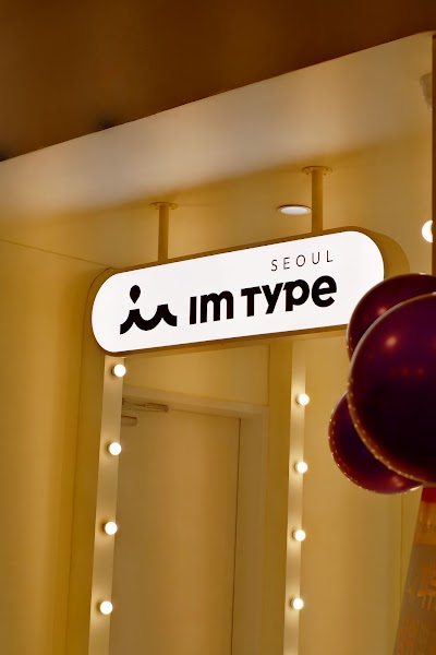 Illuminated logo sign for im type SEOUL personal color analysis studio at DDP