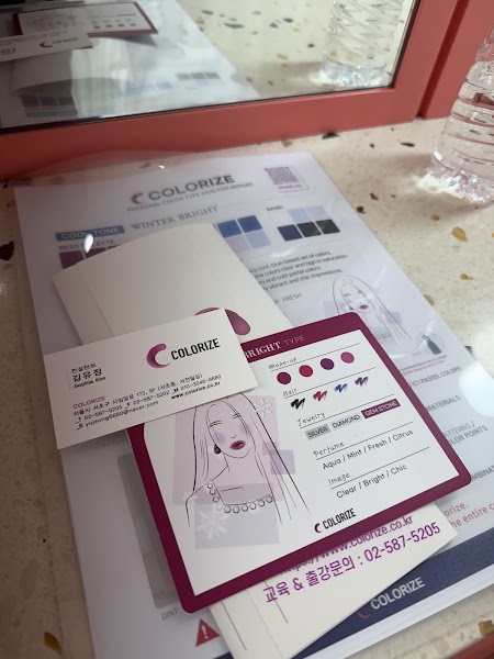 Personal color analysis report and Colorize card placed on a consultation desk