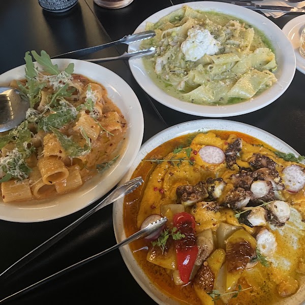 Selection of homemade pasta and octopus dishes
