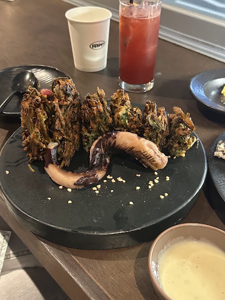 Contemporary fried dish with dipping sauce