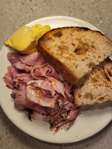 House-made sliced jambon served with toasted sourdough bread and whipped butter