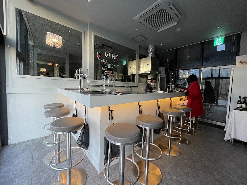 Interior counter seating and bar stools inside Yongsan Pivo