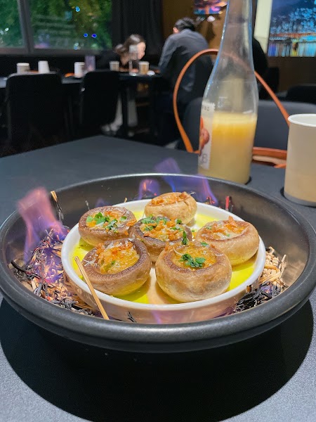 Signature flambéed appetizer dish