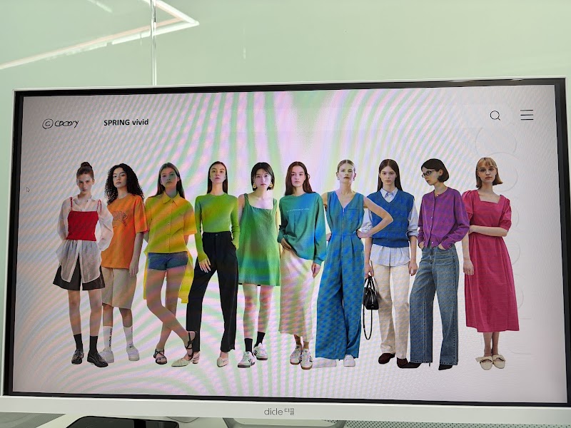Computer screen displaying color palettes and styling models at COCORY Myeongdong