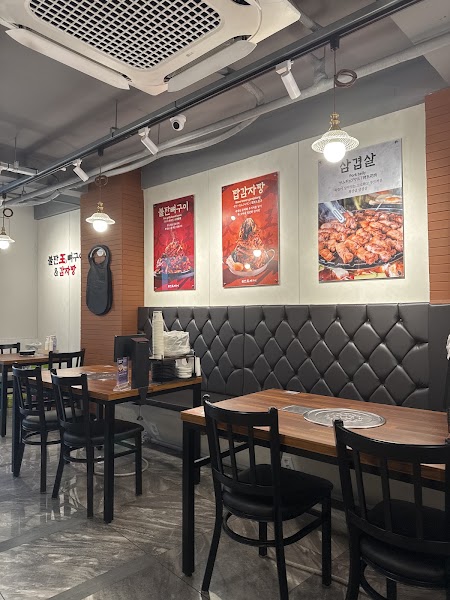 Interior dining room with comfortable booth seating at Bultan Wang Ribs Myeongdong