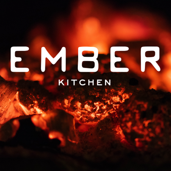 Ember Kitchen burning wood fire and live hot coals backdrop.