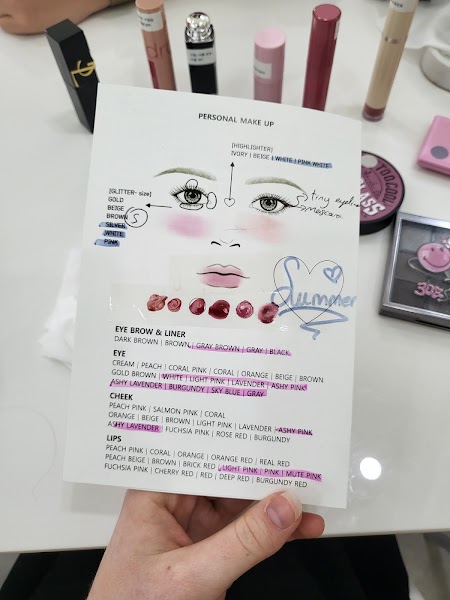 Personal makeup color chart with handwritten notes and shade swatches