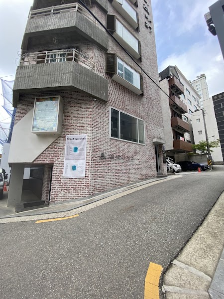 Exterior facade of the Sinsa-dong studio building in Gangnam