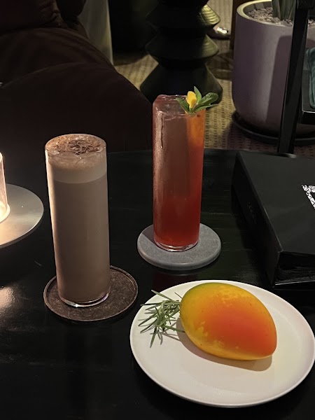Signature cocktails paired with fresh mango plate