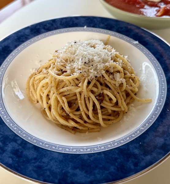 Fresh noodles tossed with butter and cracked pepper cacio e pepe