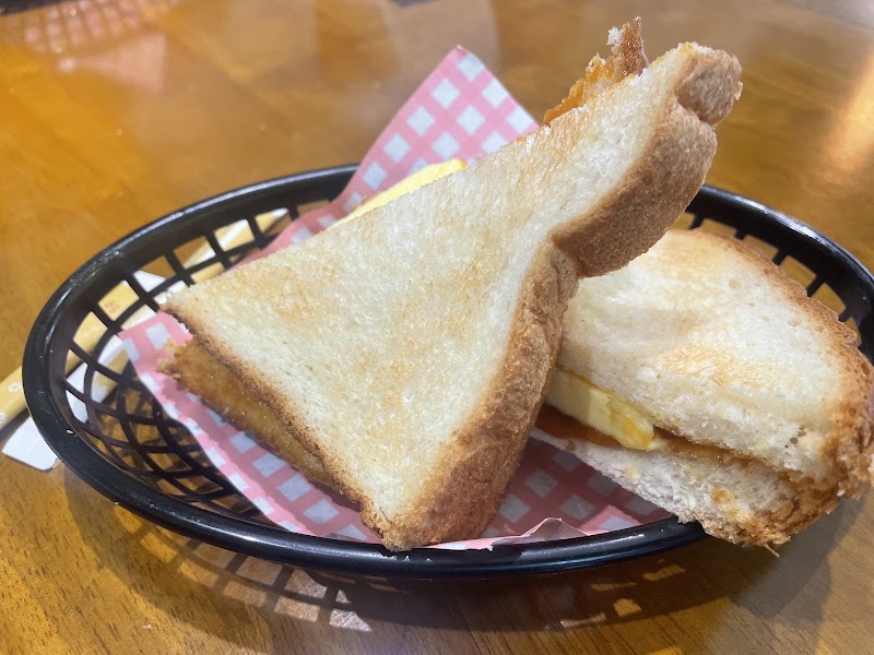 Close-up of toasted Kaya butter sandwich in a basket