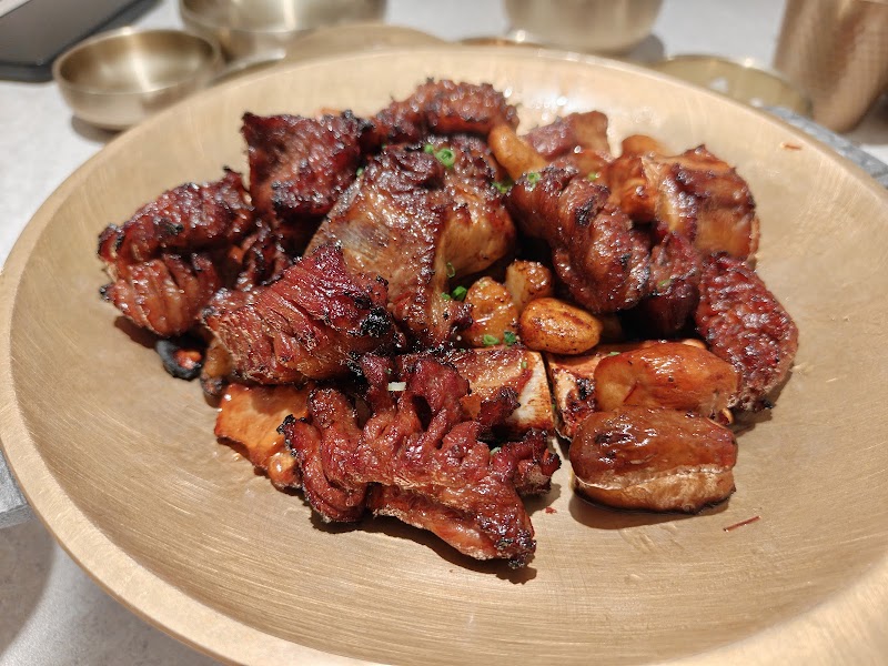 Chef-grilled beef served on brassware
