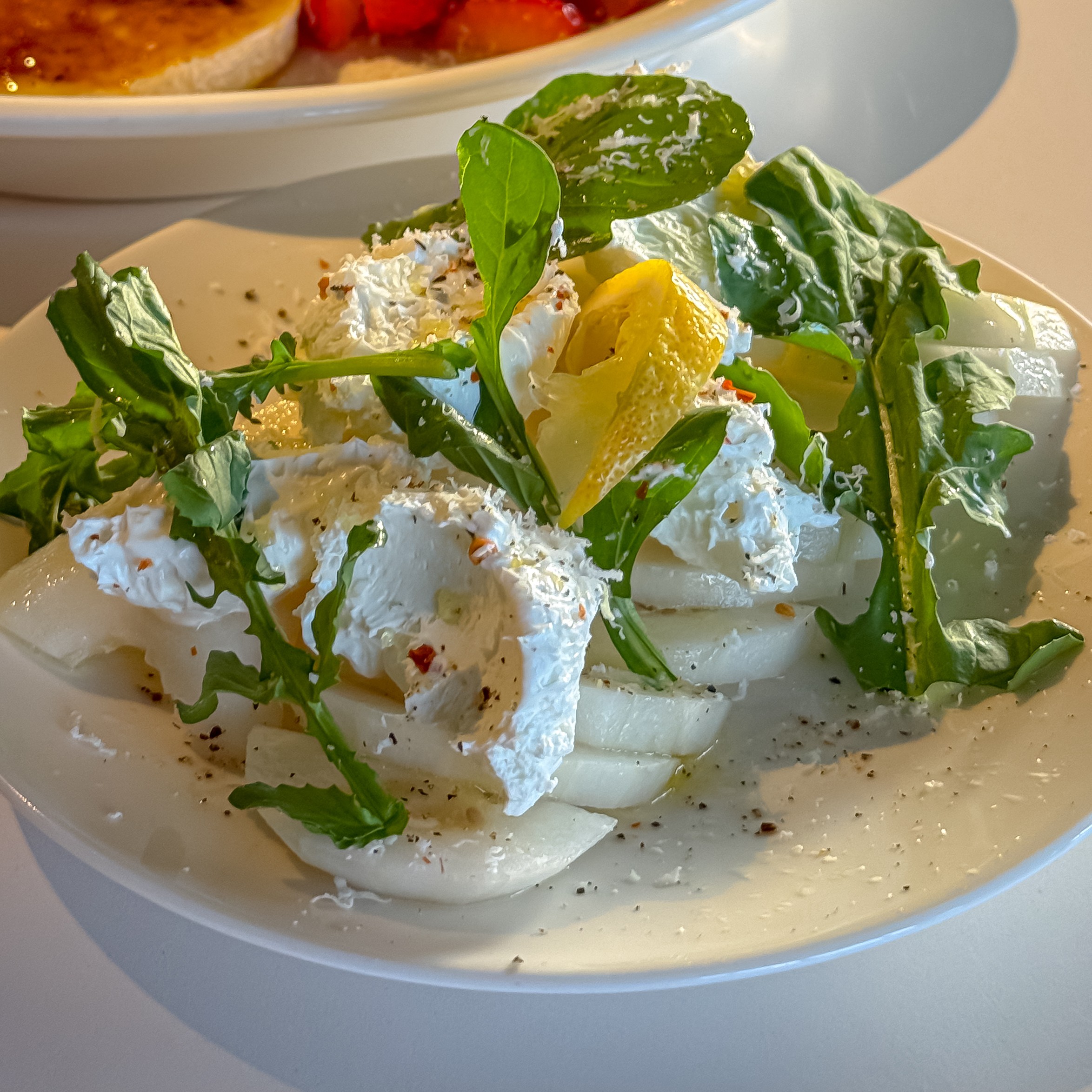 Chilled Korean melon salad with citrus lemon dressing and Grana Padano cheese