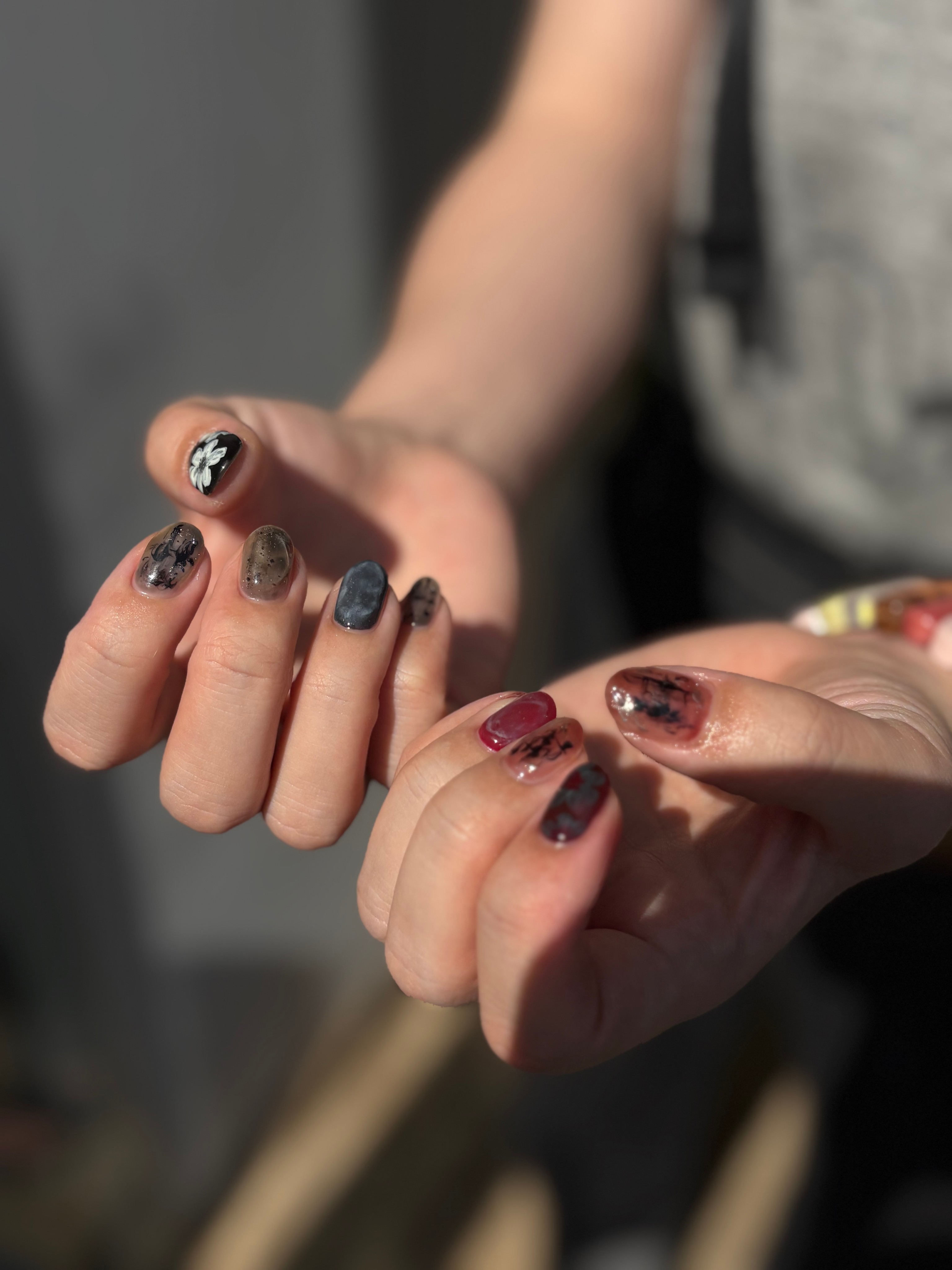 Smoky abstract nuance nail art with hand-drawn botanical lines