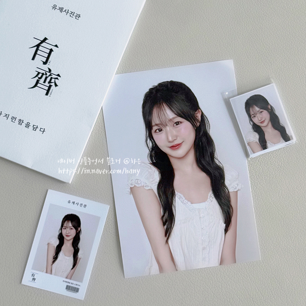 Physical photo prints, packaging sleeves, and folders from Yuje Studio