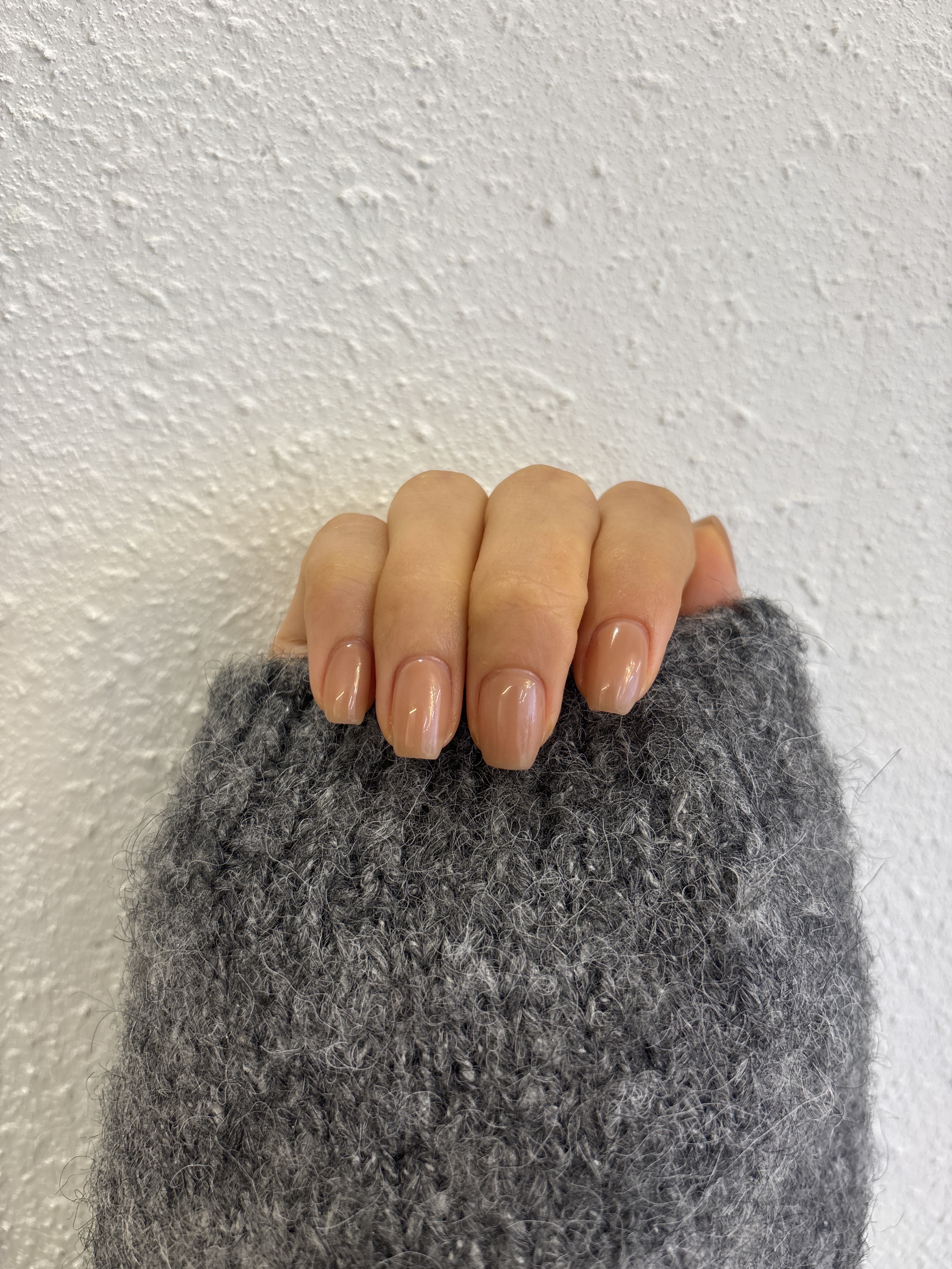 Glossy neutral beige square-shaped gel manicure