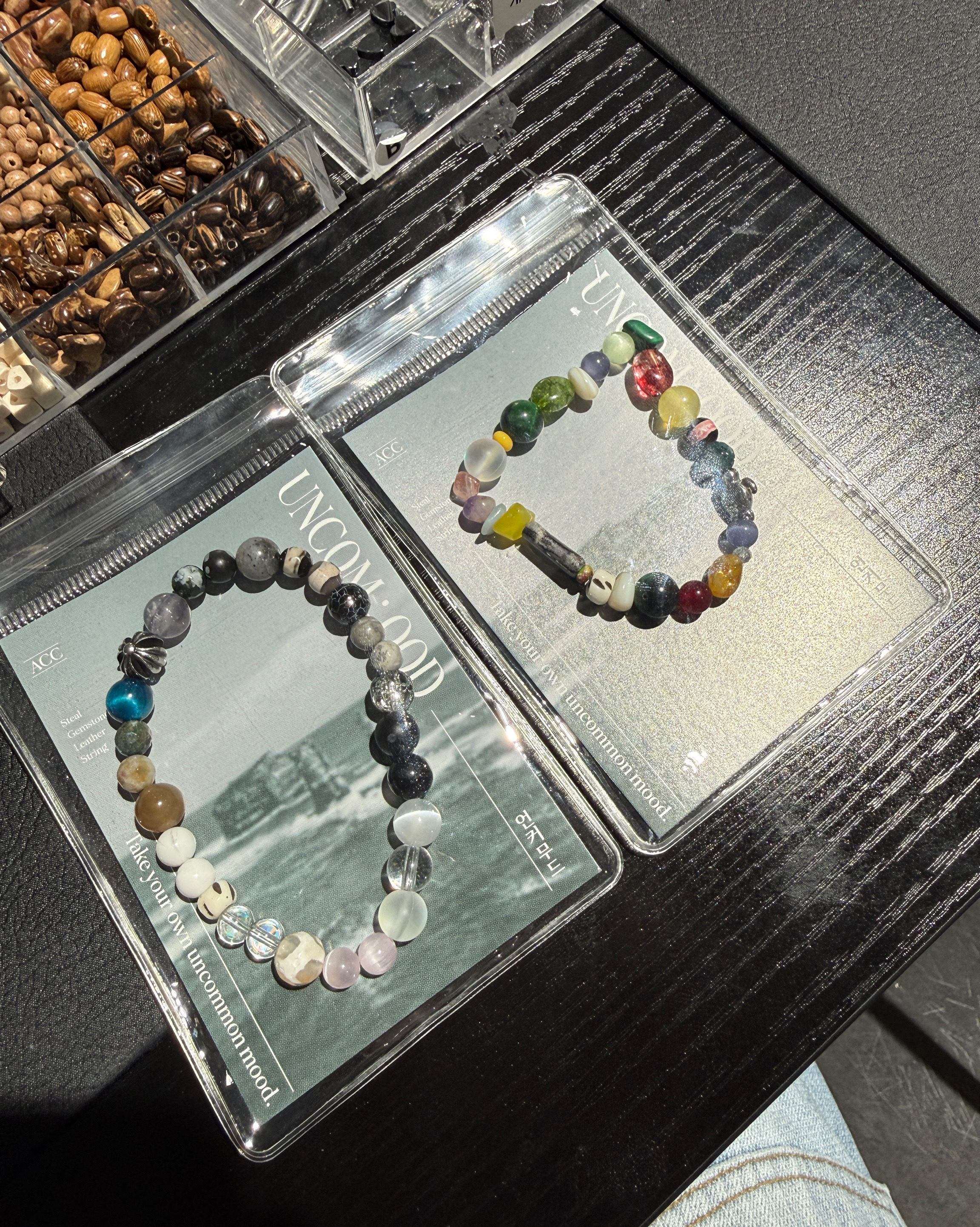 Finished beaded bracelets in UNCOMOOD packaging