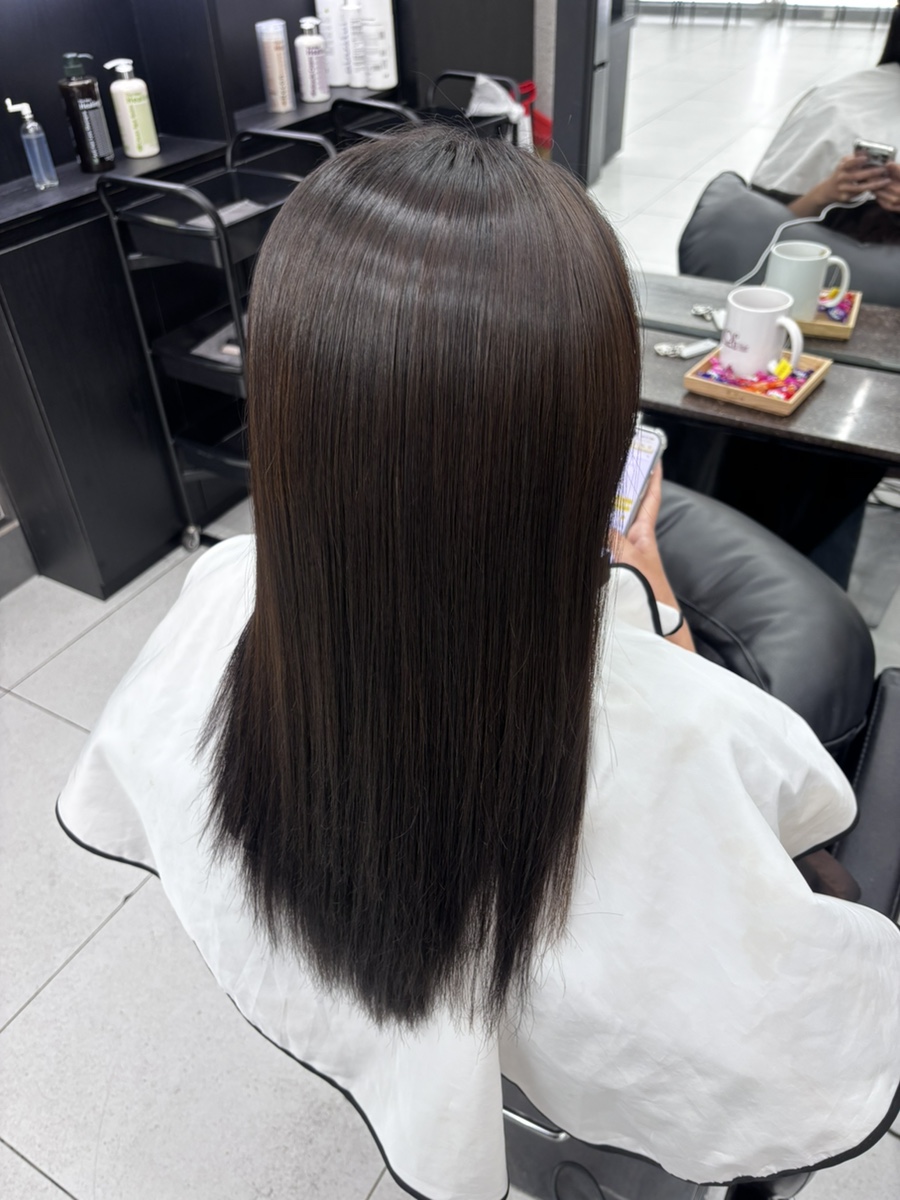 Smooth hair treatment detail at styling chair