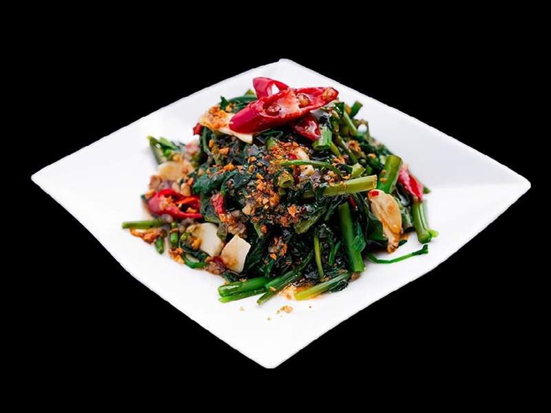 Wok-tossed Pad Pak Boong morning glory greens with garlic and red chili