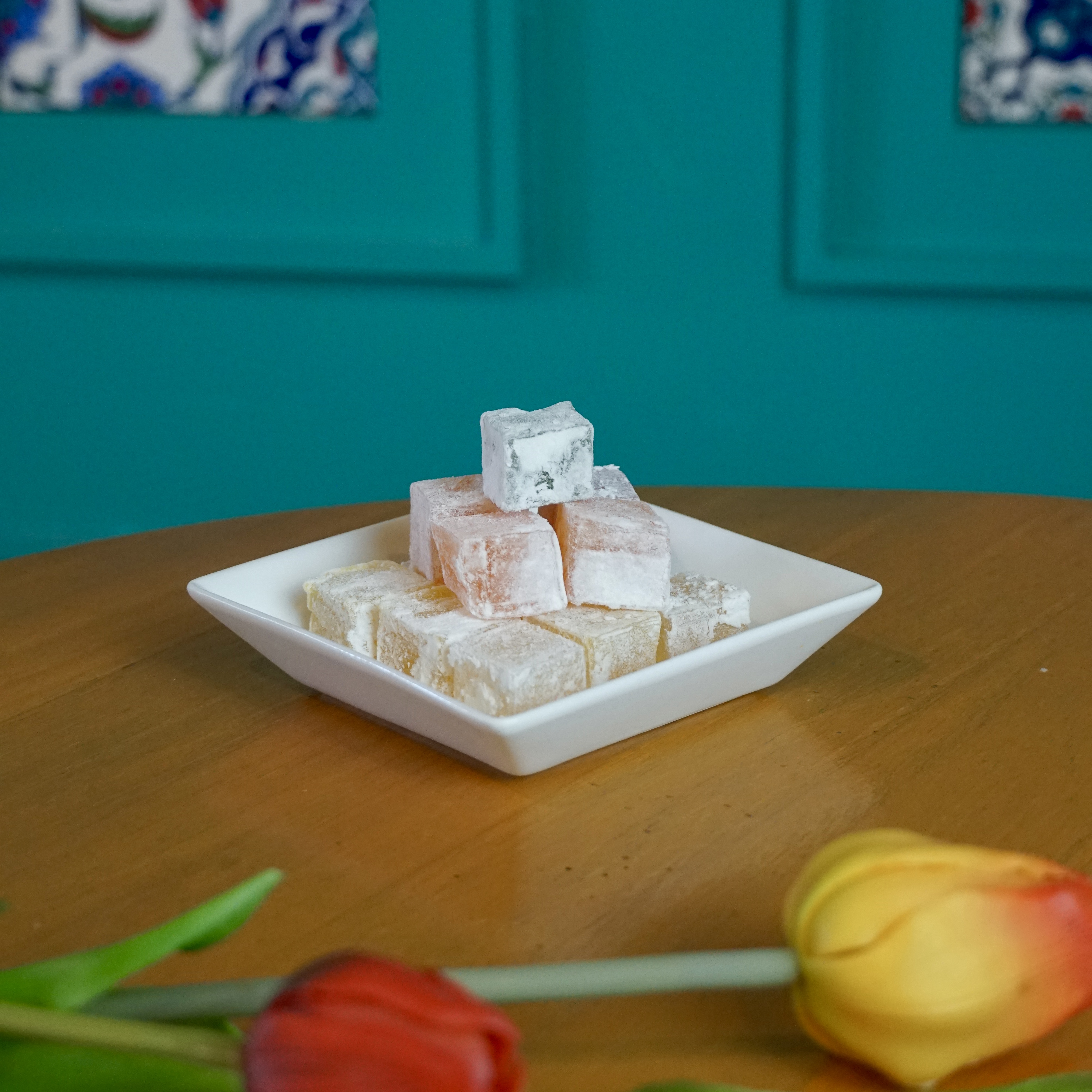 Stacked cubes of powdered sugar dusted Turkish delight sweets