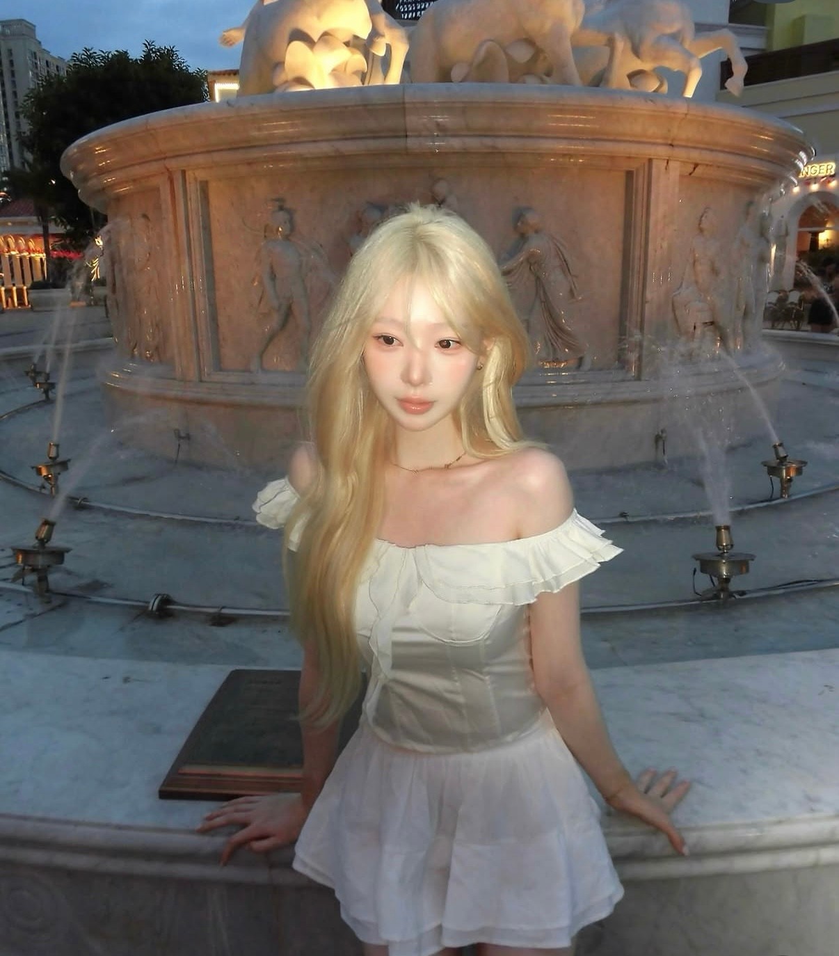 Signature luminous platinum blonde hair design