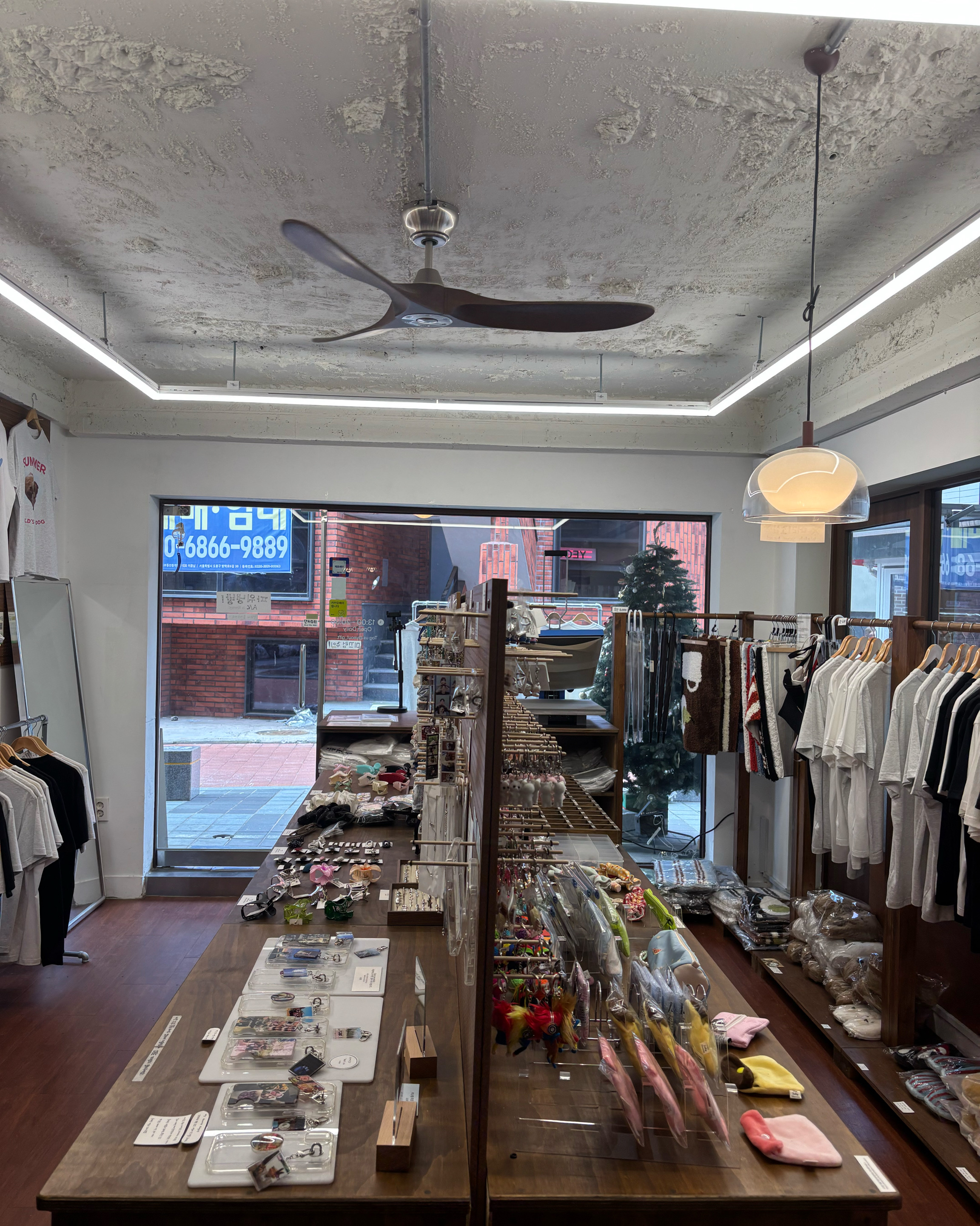 Overview of Yeoul boutique interior showing wood shelving