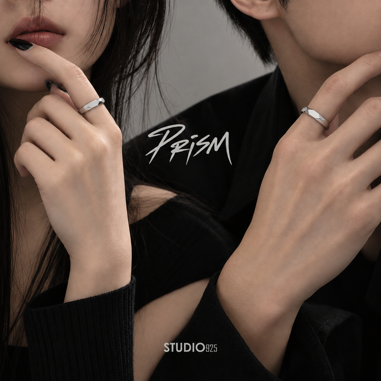 Matching geometric faceted silver rings worn on hands