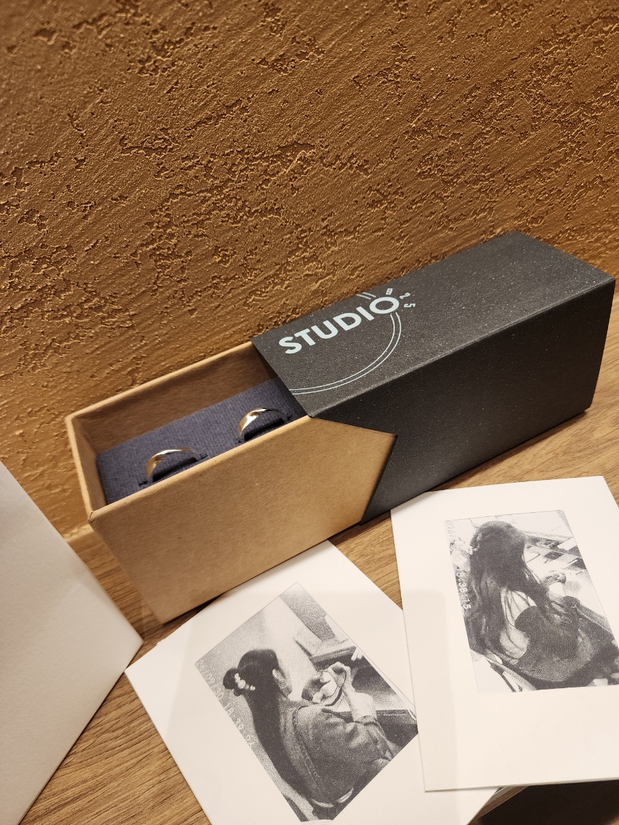Branded Studio 925 ring box containing two finished custom silver rings