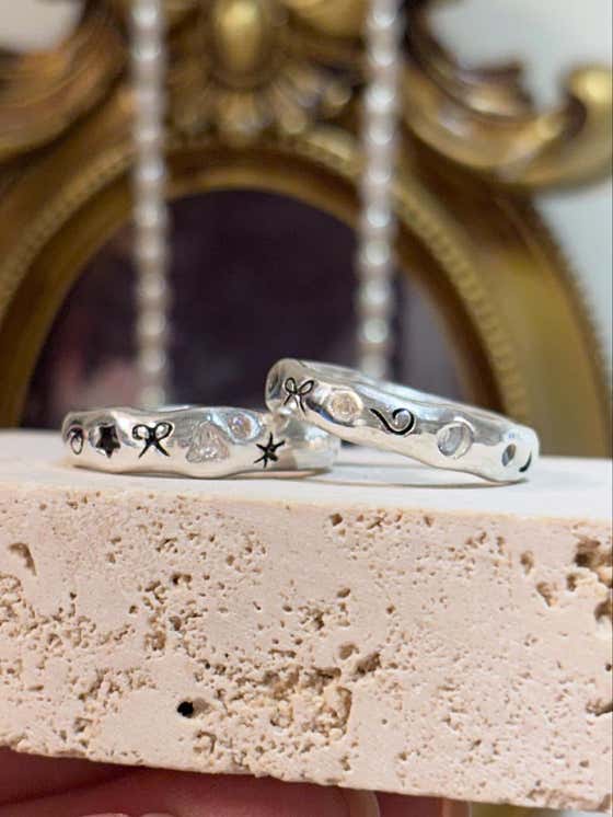 Premium handcrafted silver pieces on stone display