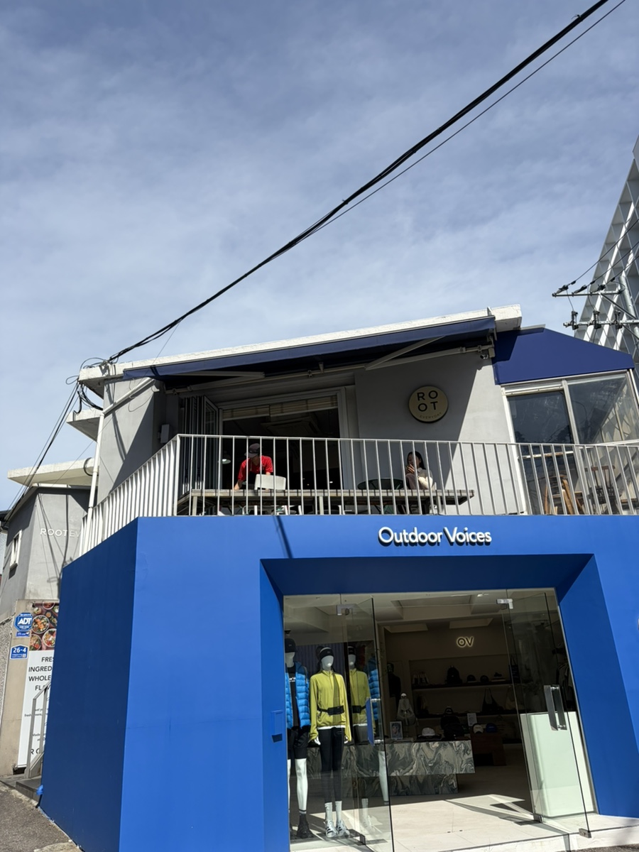 Street view exterior of the building in Hannam-dong featuring Root Everyday on the second floor
