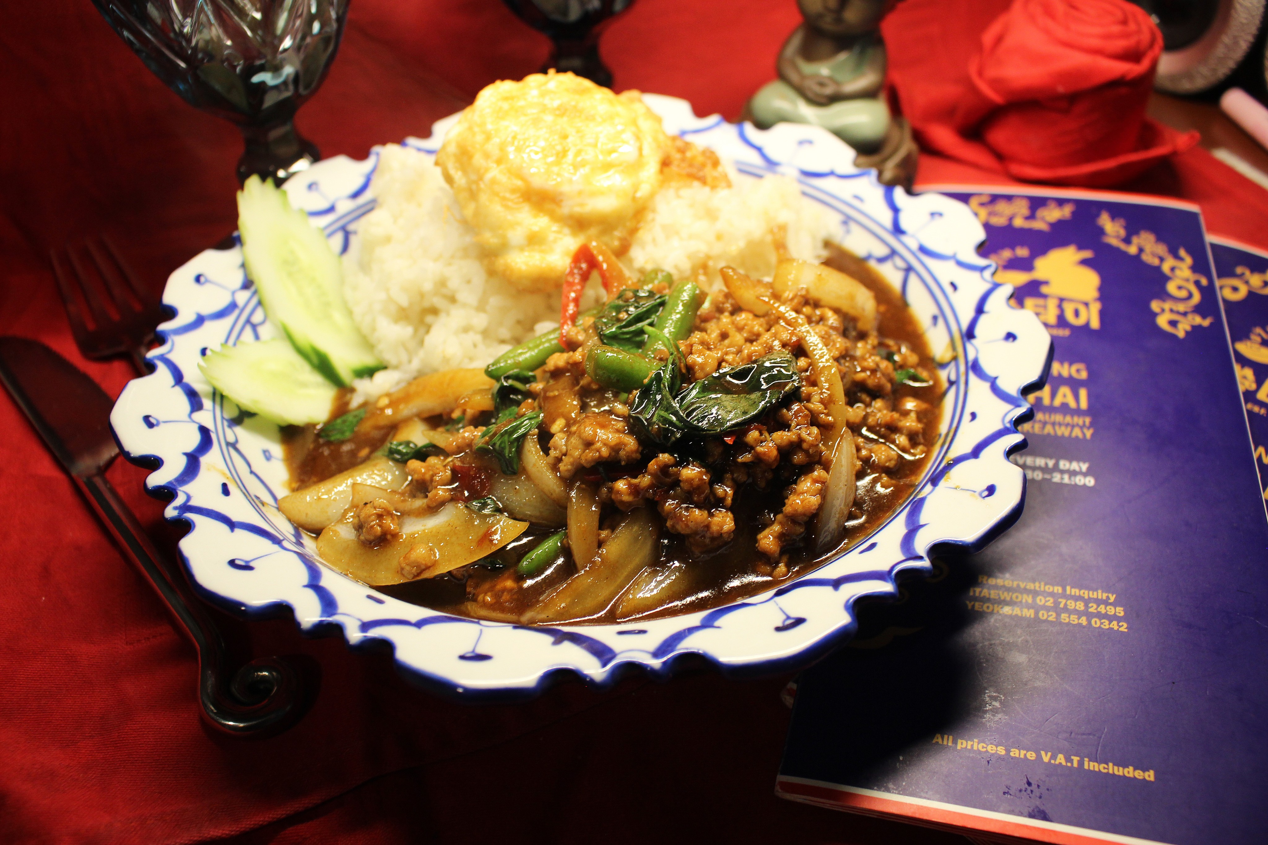 Thai basil stir-fry with rice and fried egg
