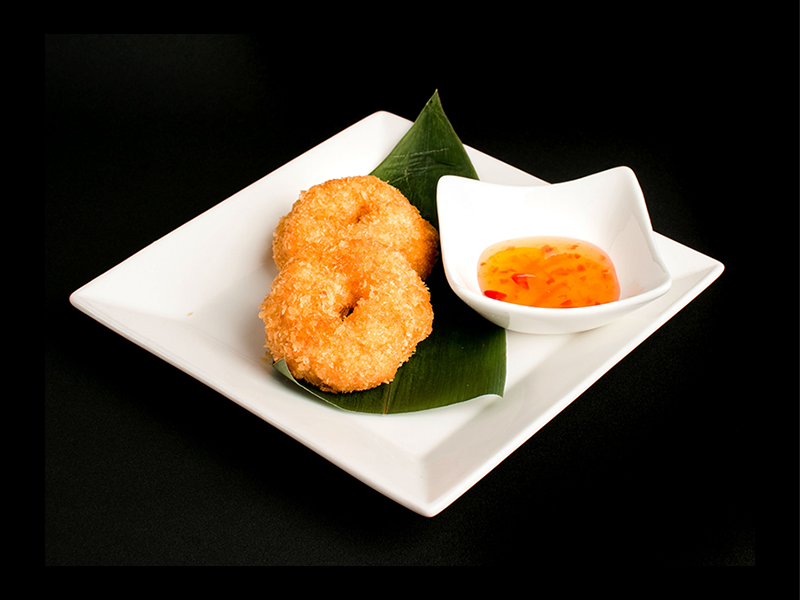 Handcrafted Tod Man Goong golden fried shrimp cakes with house dipping sauce