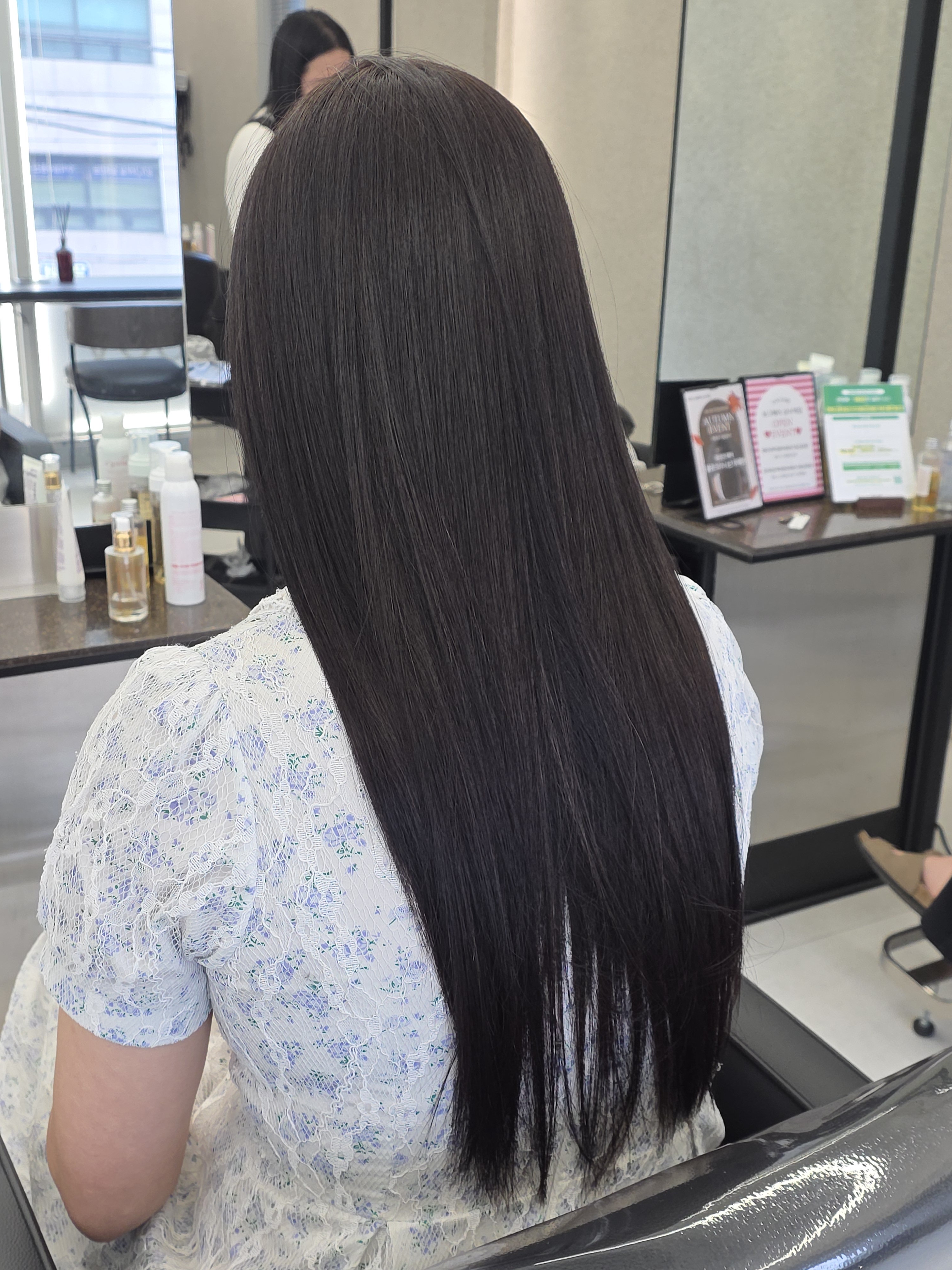 Long straight sleek dark hair treatment result