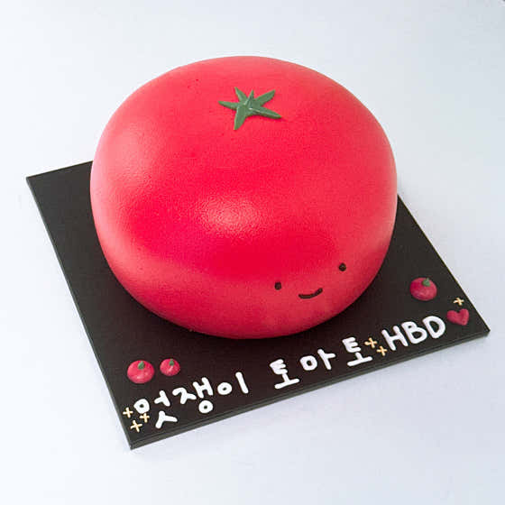 Cute tomato character cake