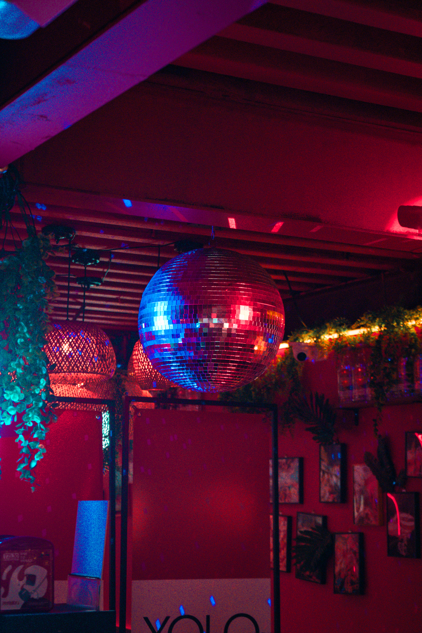 Moody cantina interior with hanging lights and celebratory atmosphere