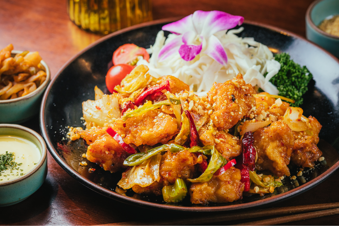 Crispy stir-fried dish with nuts and dipping condiments