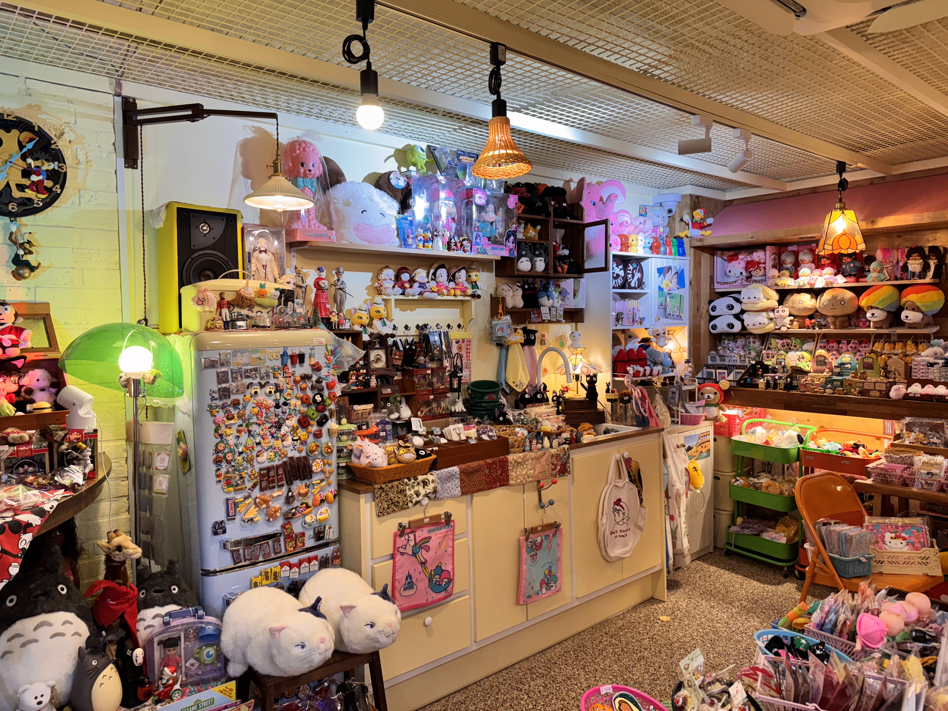 Vintage shop corner covered with magnets and character goods