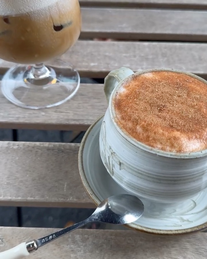 Ceramic cup of spiced coffee on a saucer