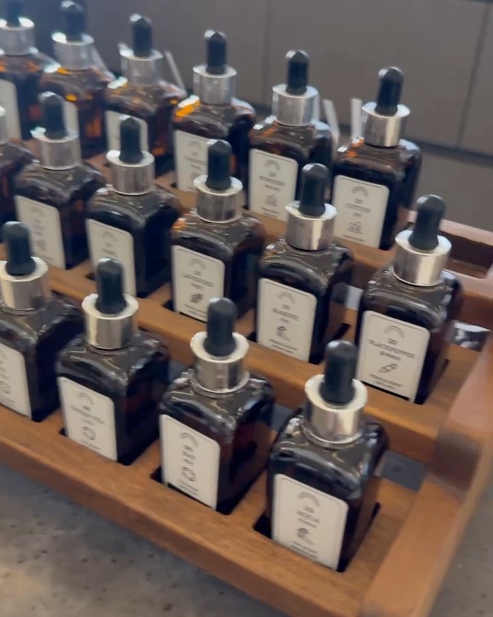 Apothecary amber dropper bottles organized in a workshop tray
