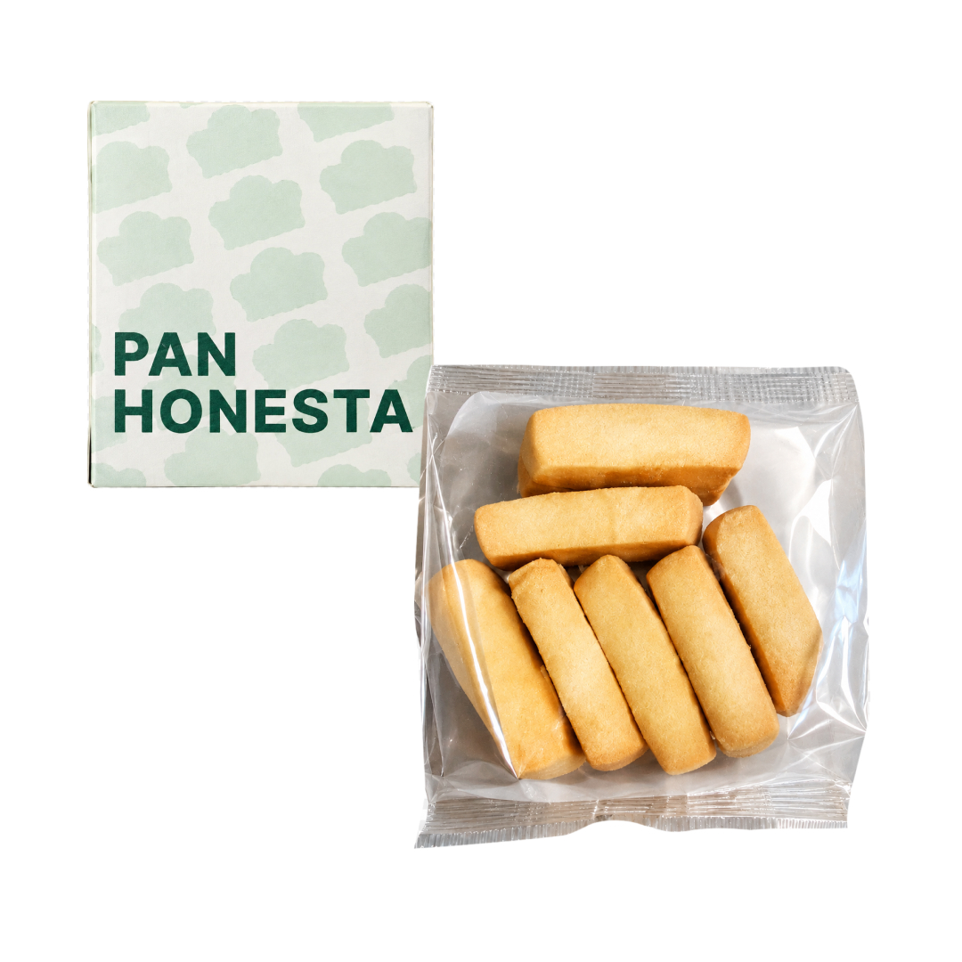 Pan Honesta square gift box next to a transparent plastic bag containing rectangular golden-brown cookies.