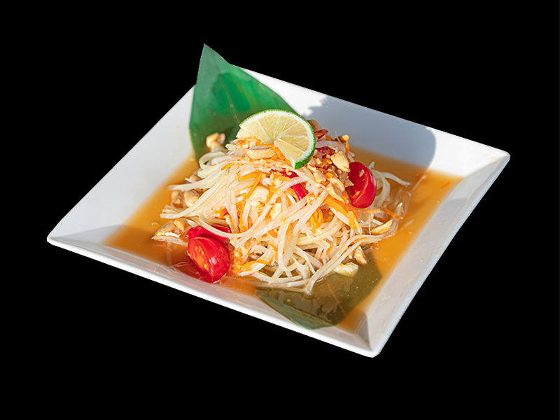 Fresh Som Tam green papaya salad with cherry tomatoes, roasted peanuts, and lime