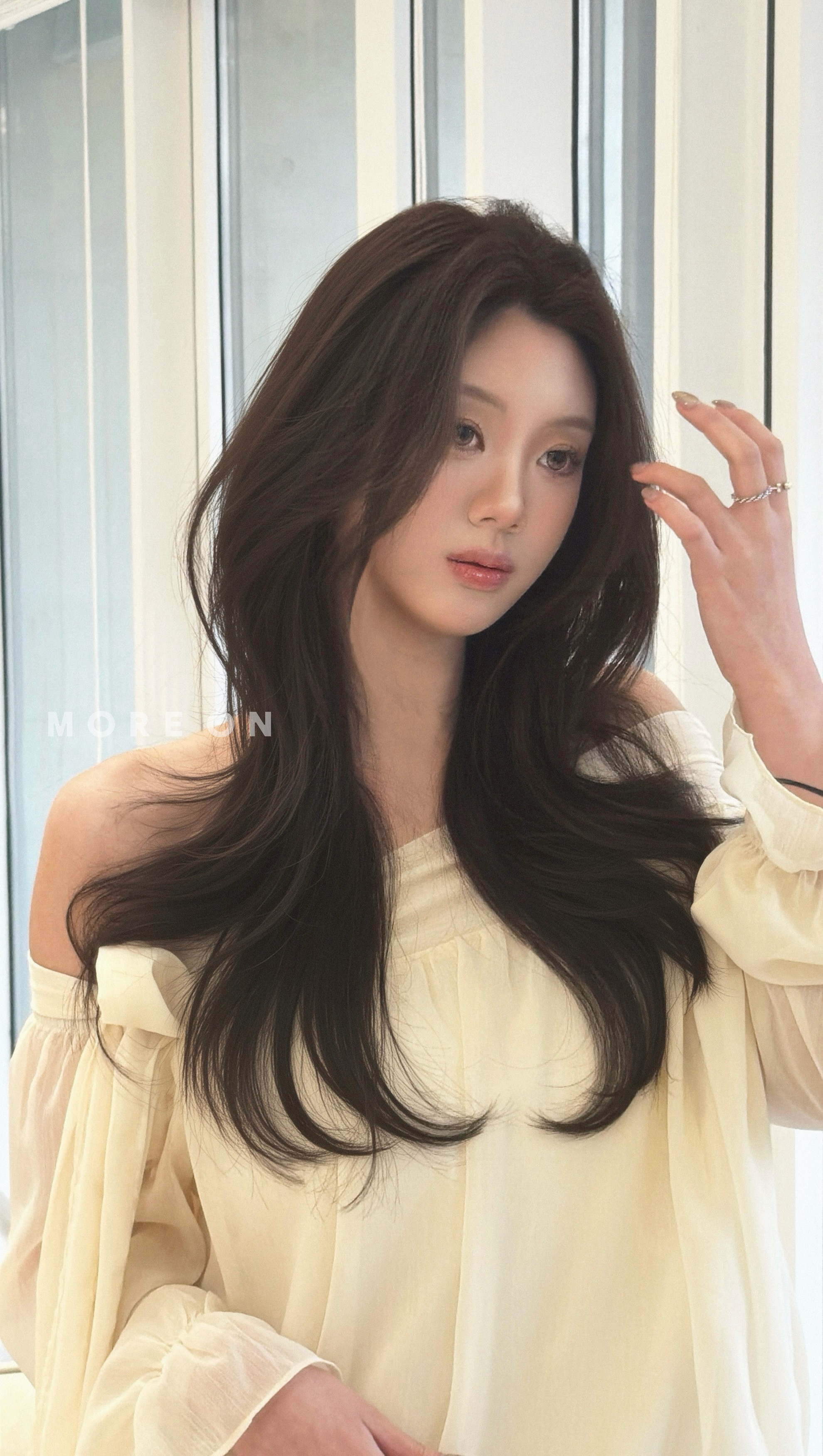 Soft voluminous layered style created at More On Hair Hapjeong.