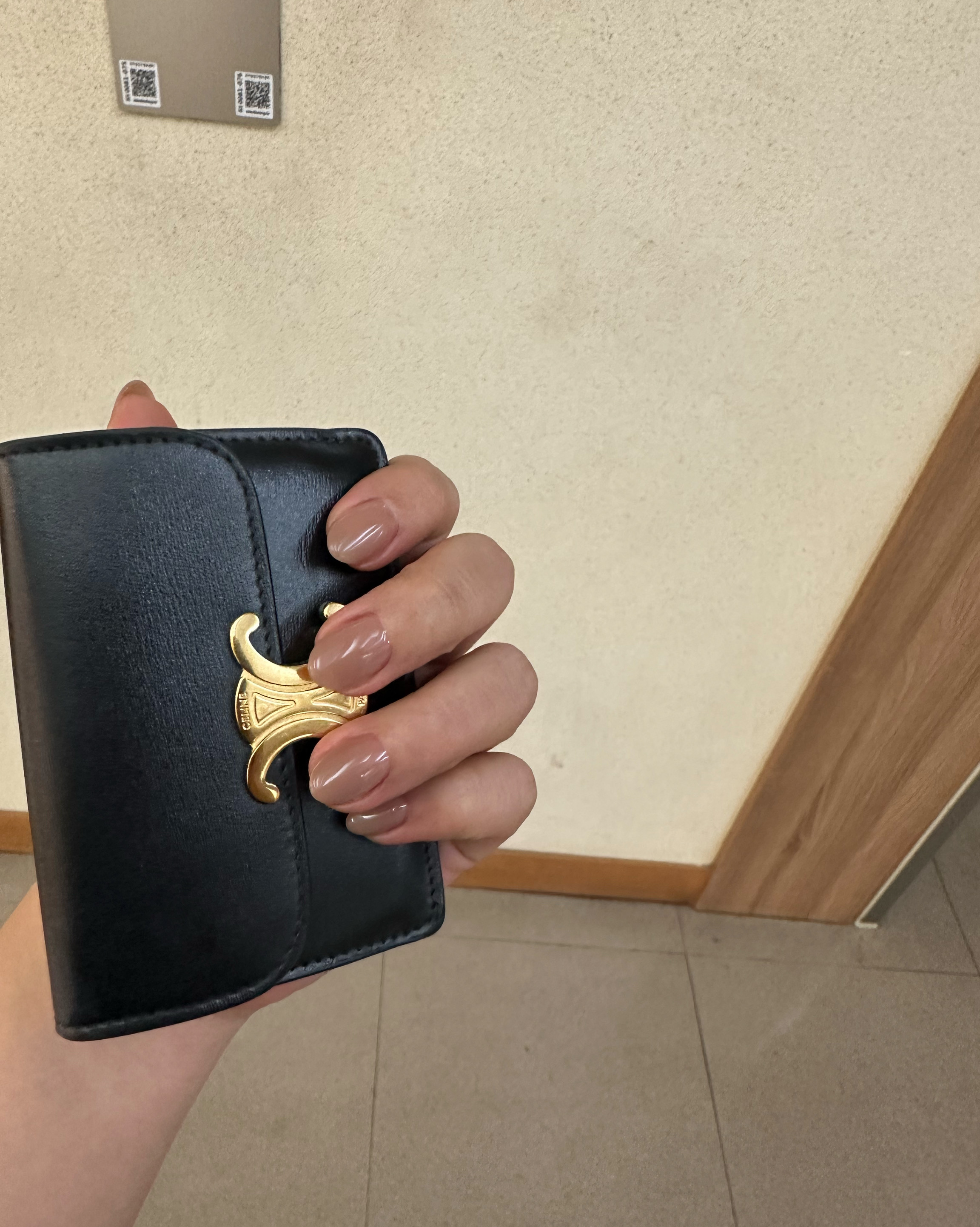 Clean and elegant high-shine nude gel manicure