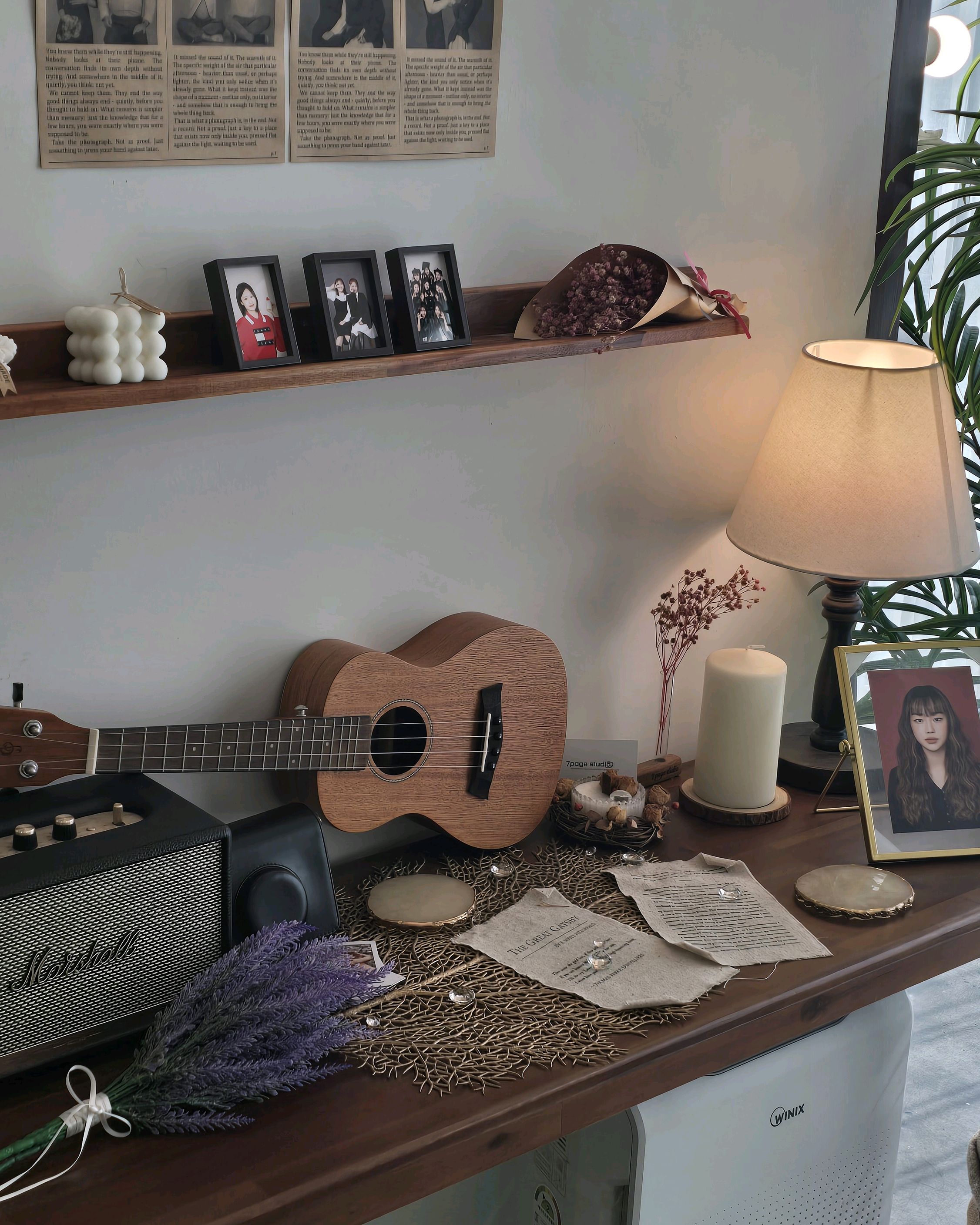 Cozy studio corner with ukulele and vintage lamp