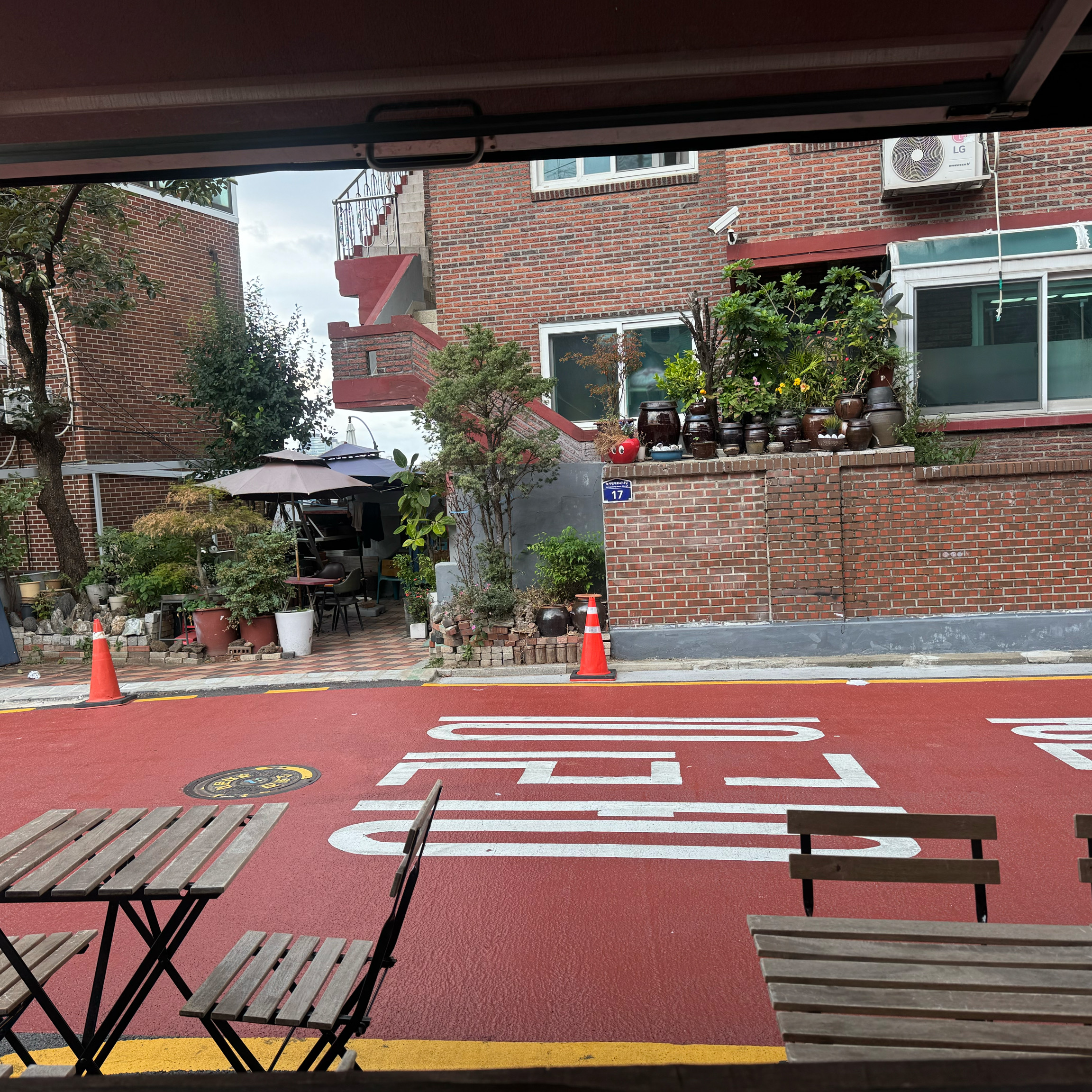 Peaceful neighborhood street view seen from under the cafe awning