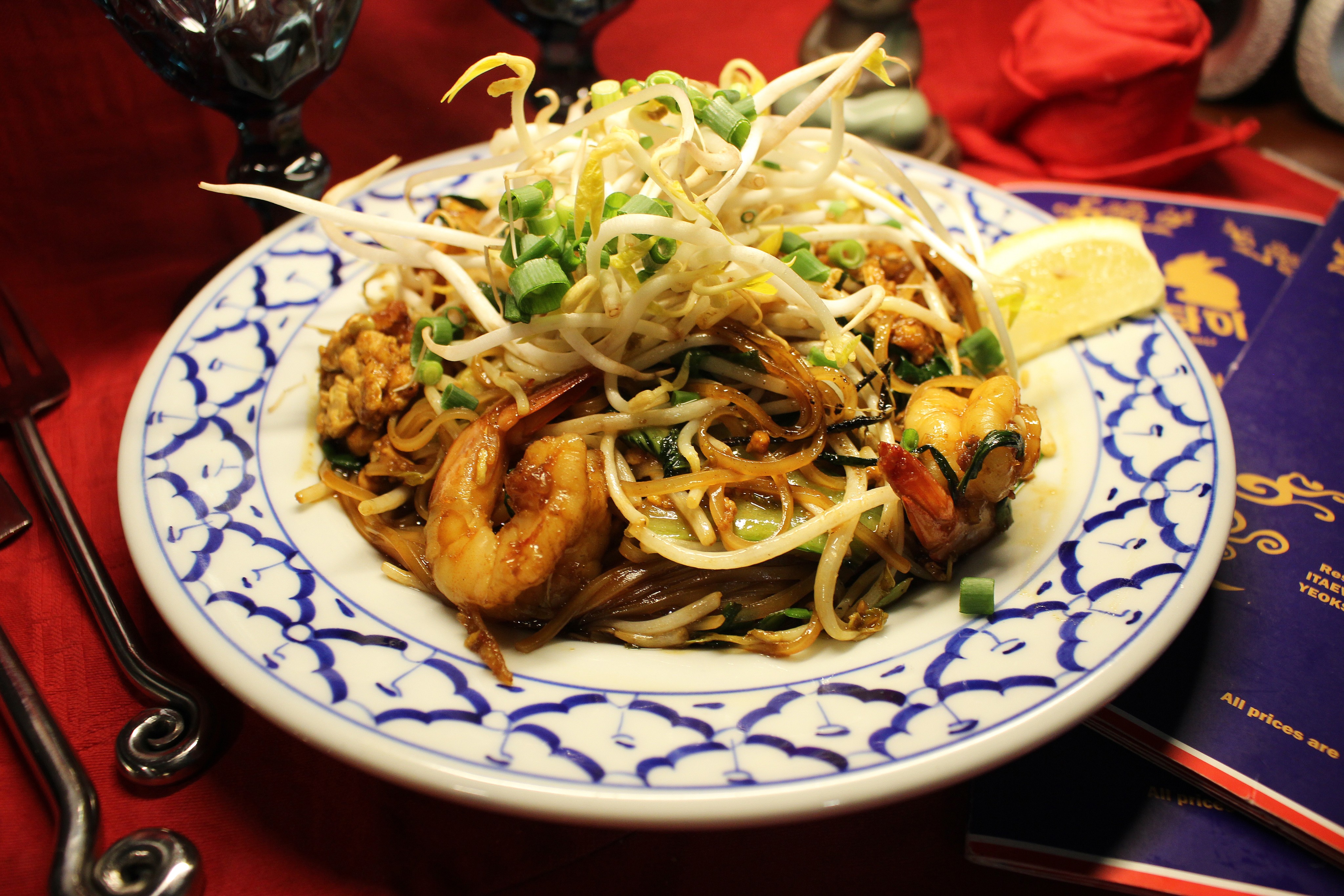 Pad Thai stir-fried noodles with shrimp, bean sprouts, and scallions